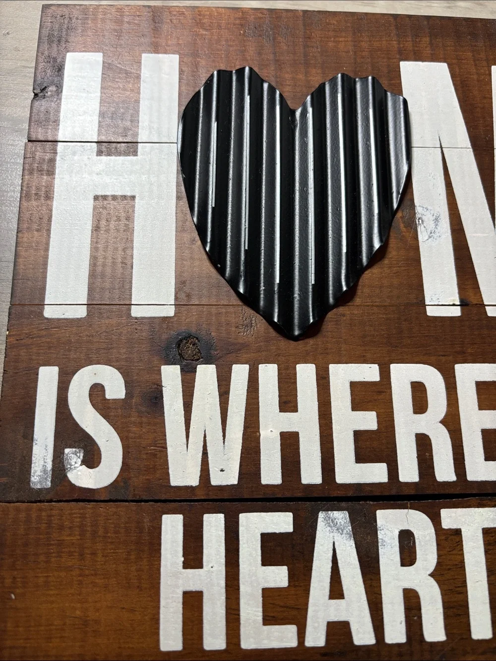 Rustic wooden 'Home Is Where The Heart Is' Wall Sign with metal accent